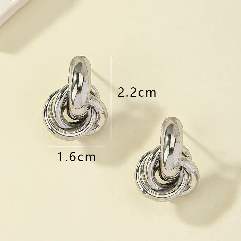 Classic Knot Stud Earrings in Gold and Sleek Silver