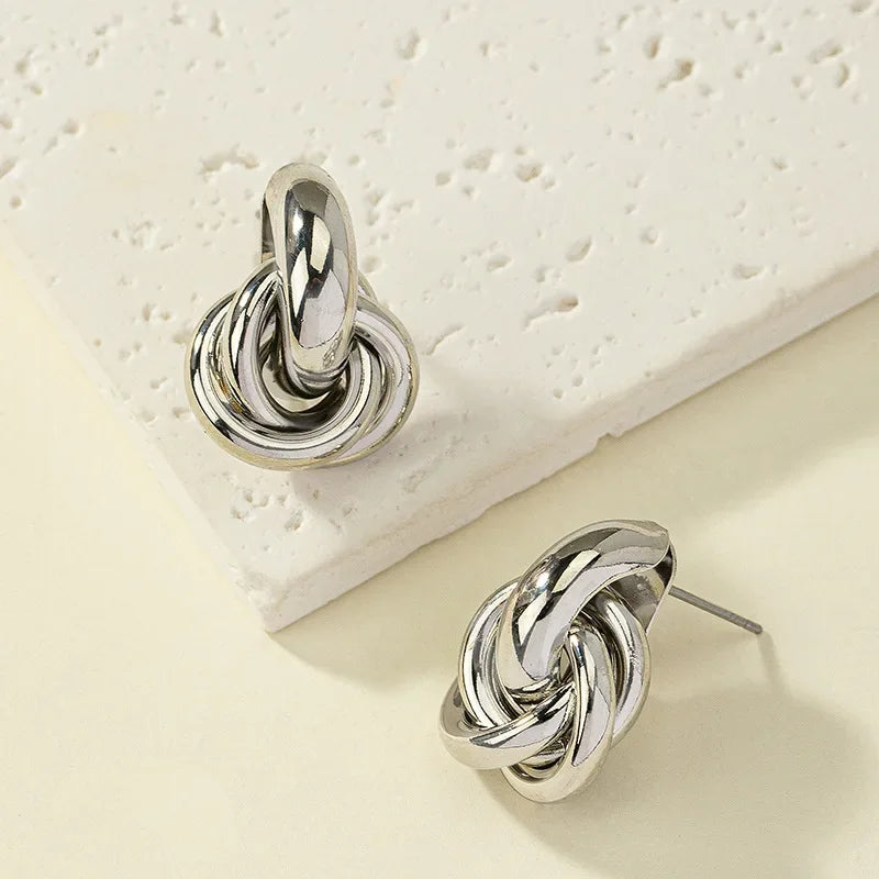 Classic Knot Stud Earrings in Gold and Sleek Silver