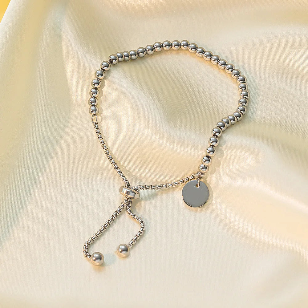 Adjustable Small Ball Beaded Bracelet with elegant Tag