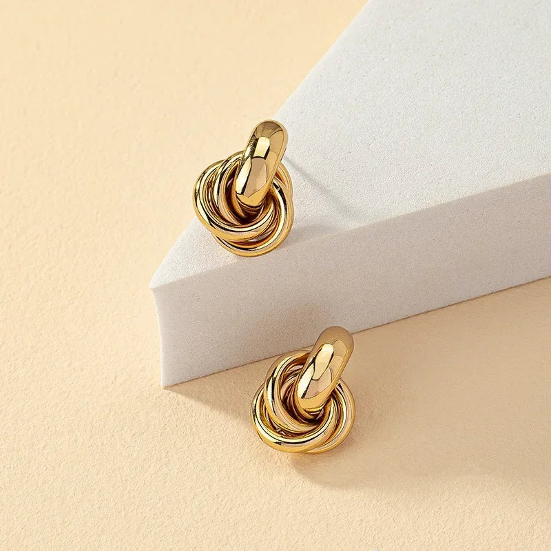 Classic Knot Stud Earrings in Gold and Sleek Silver