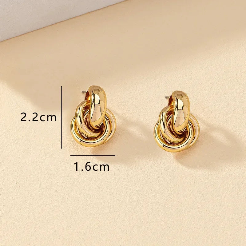 Classic Knot Stud Earrings in Gold and Sleek Silver