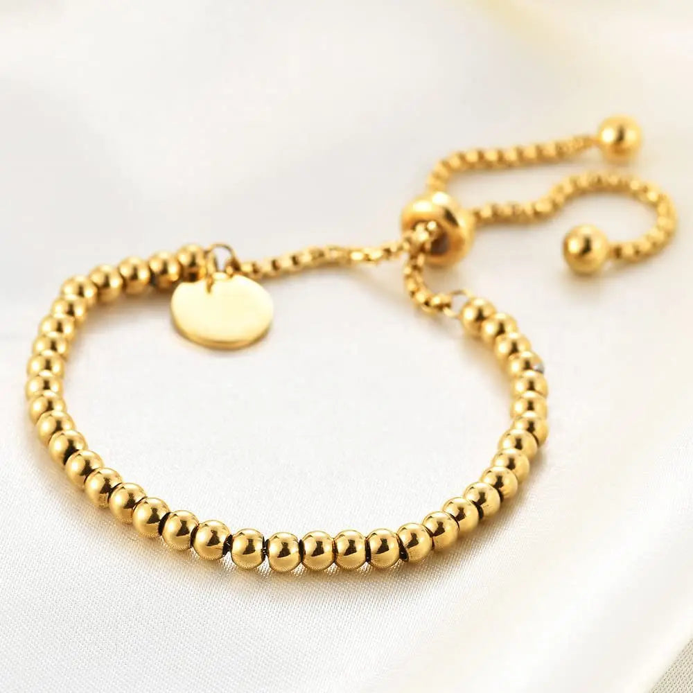 Adjustable Small Ball Beaded Bracelet with elegant Tag
