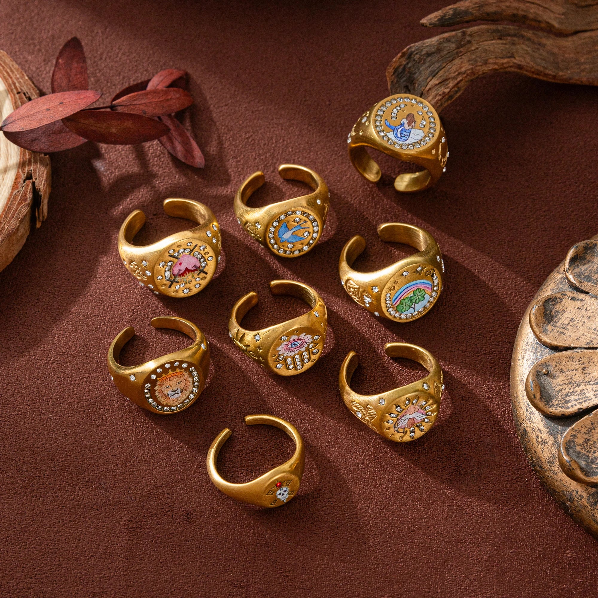 Emblem of Strength Gold‑Plated Art Ring – Lion, Mermaid, Doves, Cupid, Skull & Evil Eye Design