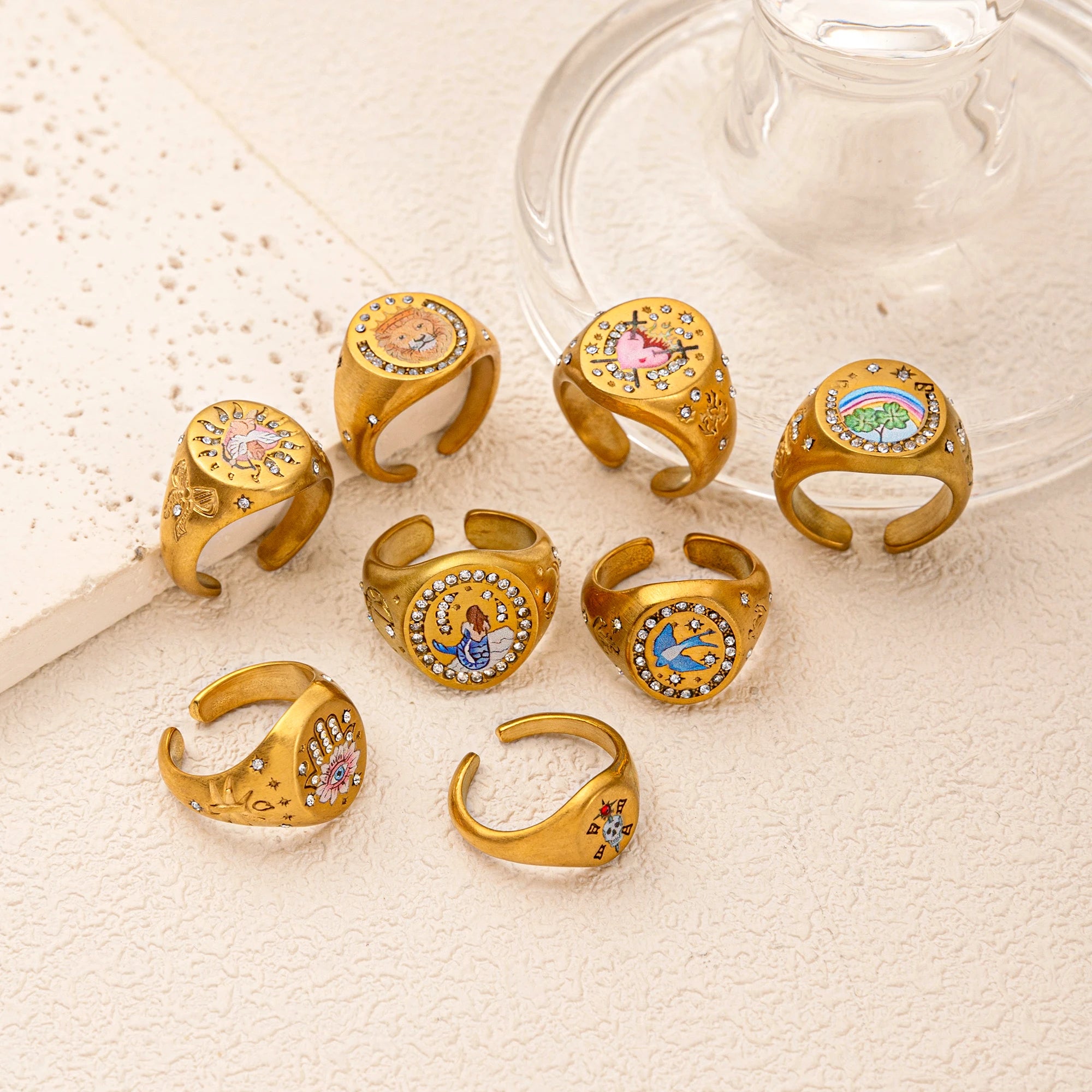 Emblem of Strength Gold‑Plated Art Ring – Lion, Mermaid, Doves, Cupid, Skull & Evil Eye Design